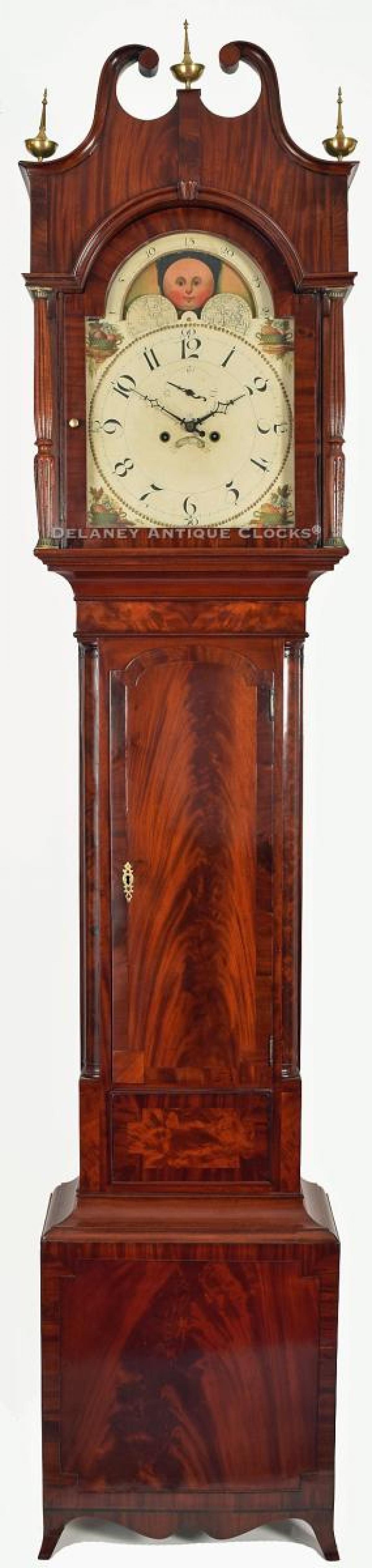 A cross-banded mahogany grandfather clock of New York state origin. This clock case is attributed to the cabinetmaking firm of Wood & Taylor. XXSL-56.