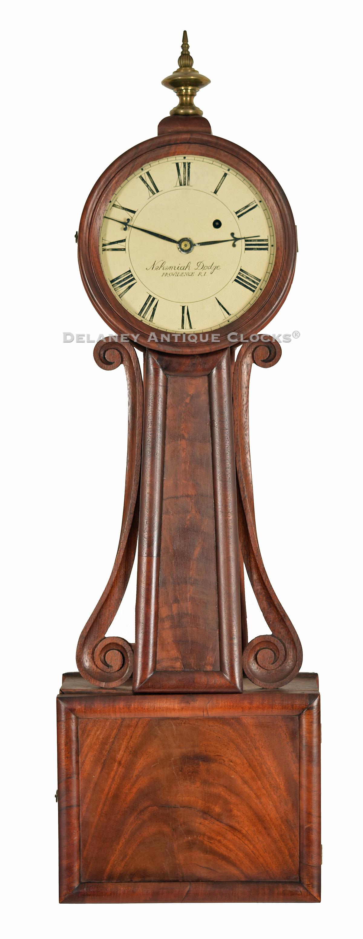 Nehemiah Dodge of Providence, RI. A wood-paneled wall timepiece or banjo clock. 222065