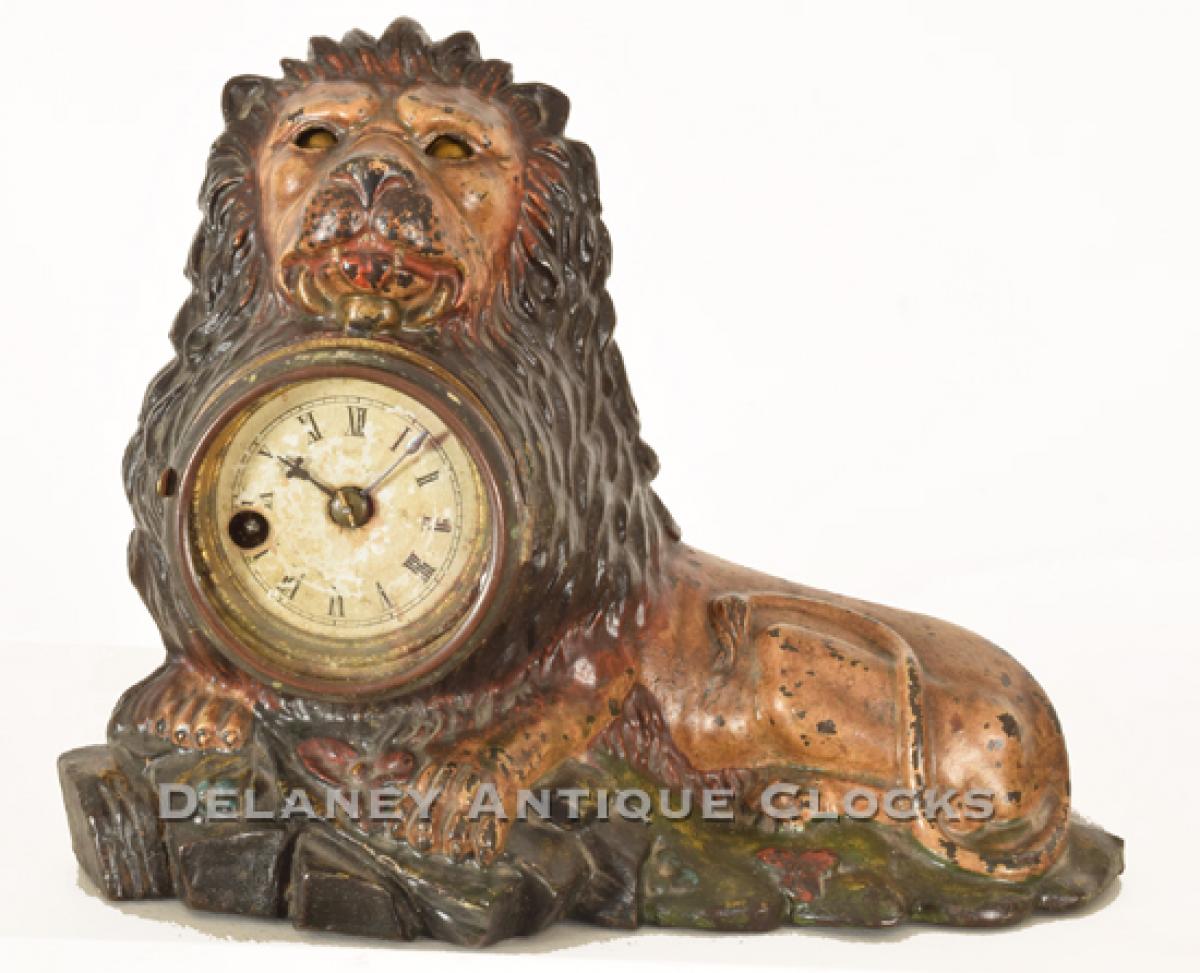 A winking lion shelf clock. 218057. Delaney Antique Clocks.