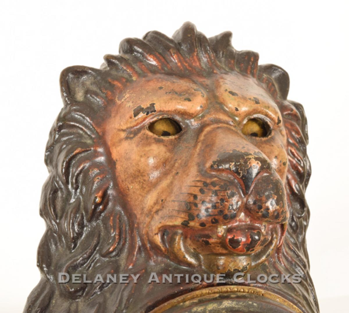 Bradley & Hubbard Blinking lion shelf clock. 218057. Delaney Antique Clocks.