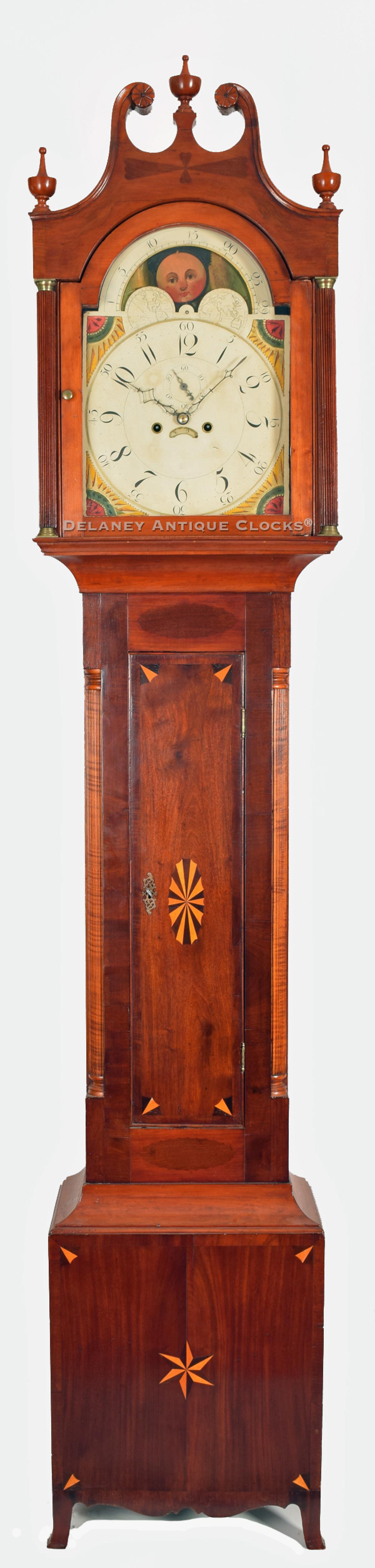 A fine mahogany cased tall clock that is decorated with fancy inlays and cross-banding. This clock and case was most likely made in Vermont. XX-15. Delaney Antique Clocks.