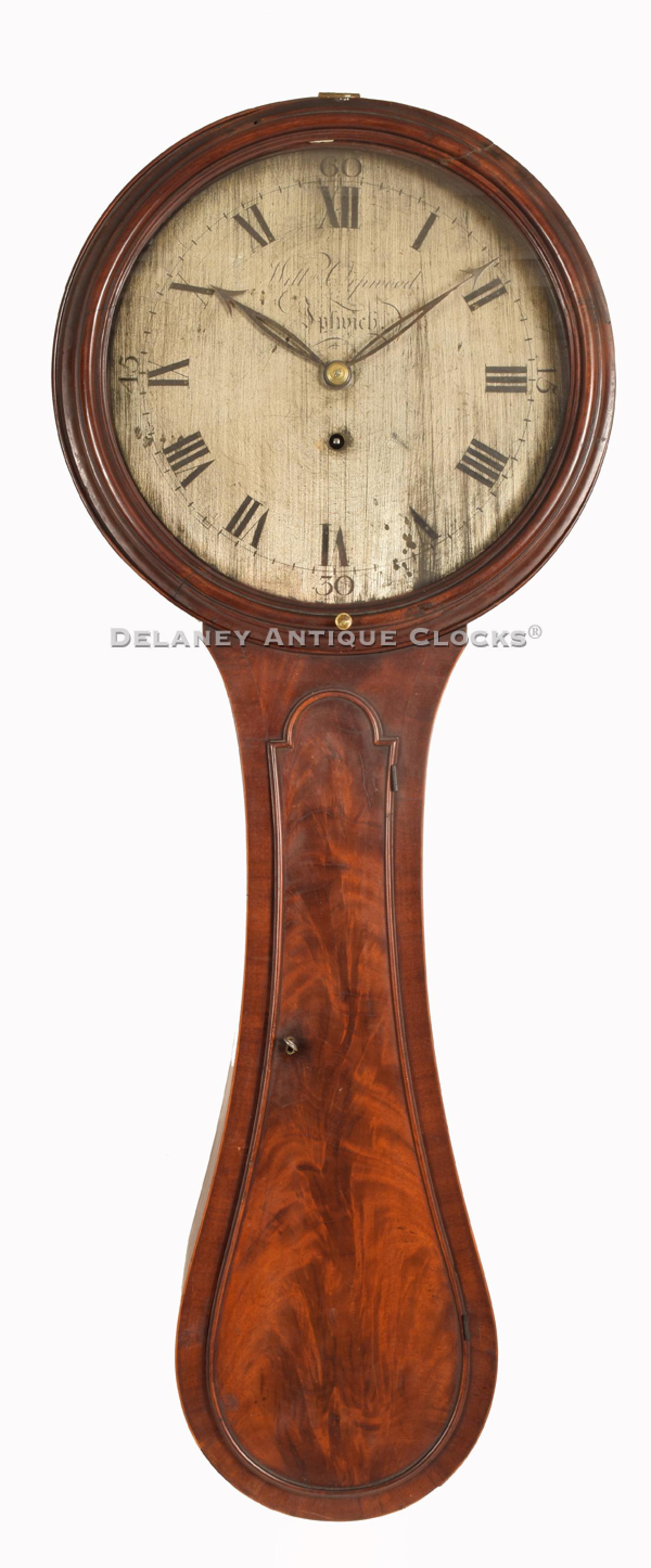 This highly figured "tear drop" style tavern clock was made by William Orpwood in Ipswich, England circa 1800. 221151. Delaney Antique Clocks.