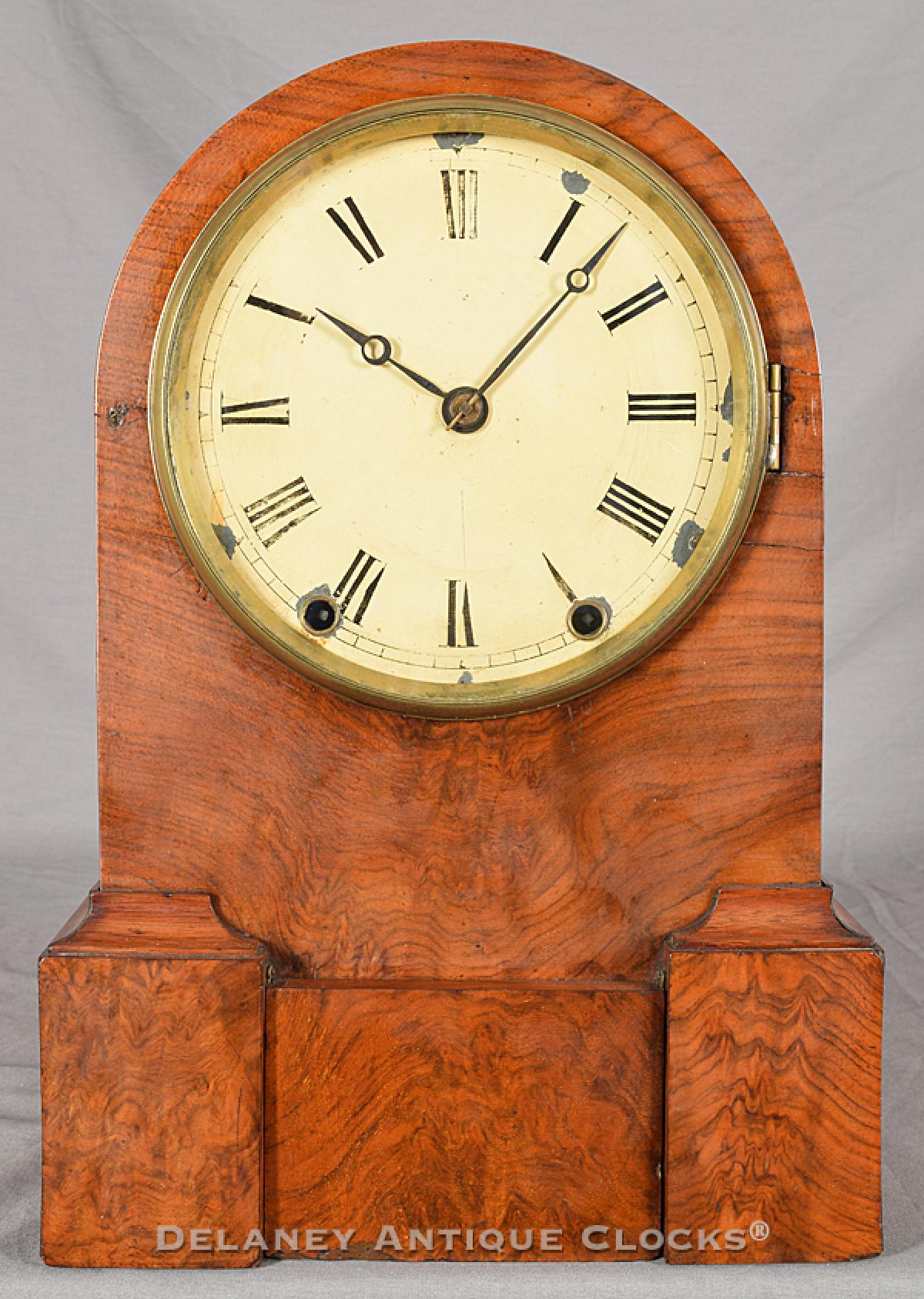 Chauncey Jerome of New Haven, Connecticut. A figured walnut case mantel clock. 220083.