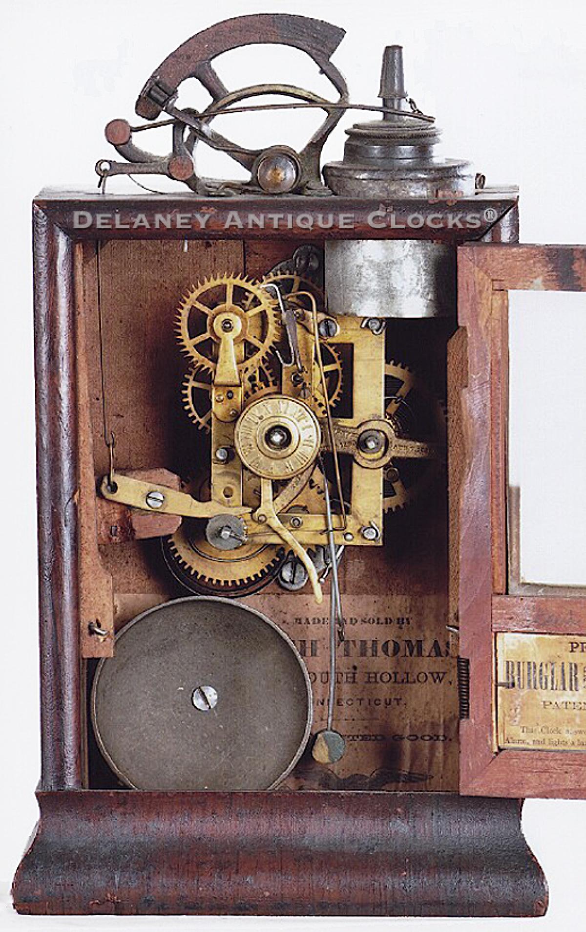 Seth Thomas Illuminating Alarm Clock. PROCTOR’S PATENT. BURGLAR AND FIRE-DETECTIVE CLOCK. PATENTED AUGUST 7, 1860.