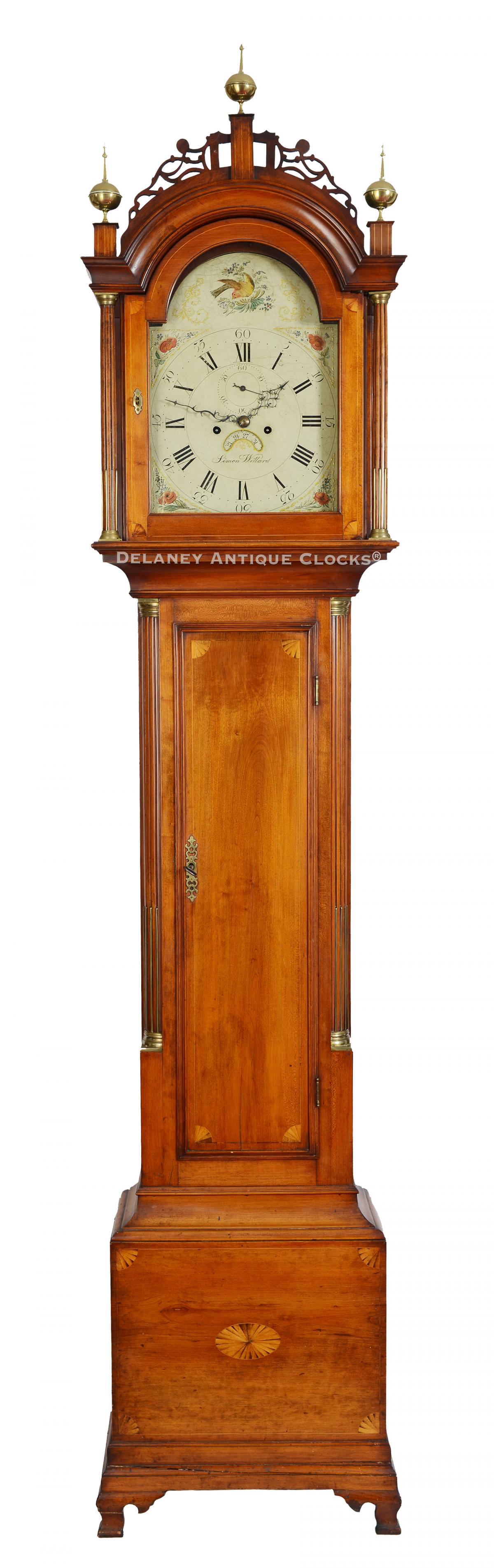 Simon Willard Tall clock. Roxbury, Massachusetts. This handsome, inlaid, tall clock is decorated with line inlay, twelve individual quarter fans, and a patera. 223275. Delaney Antique Clocks.