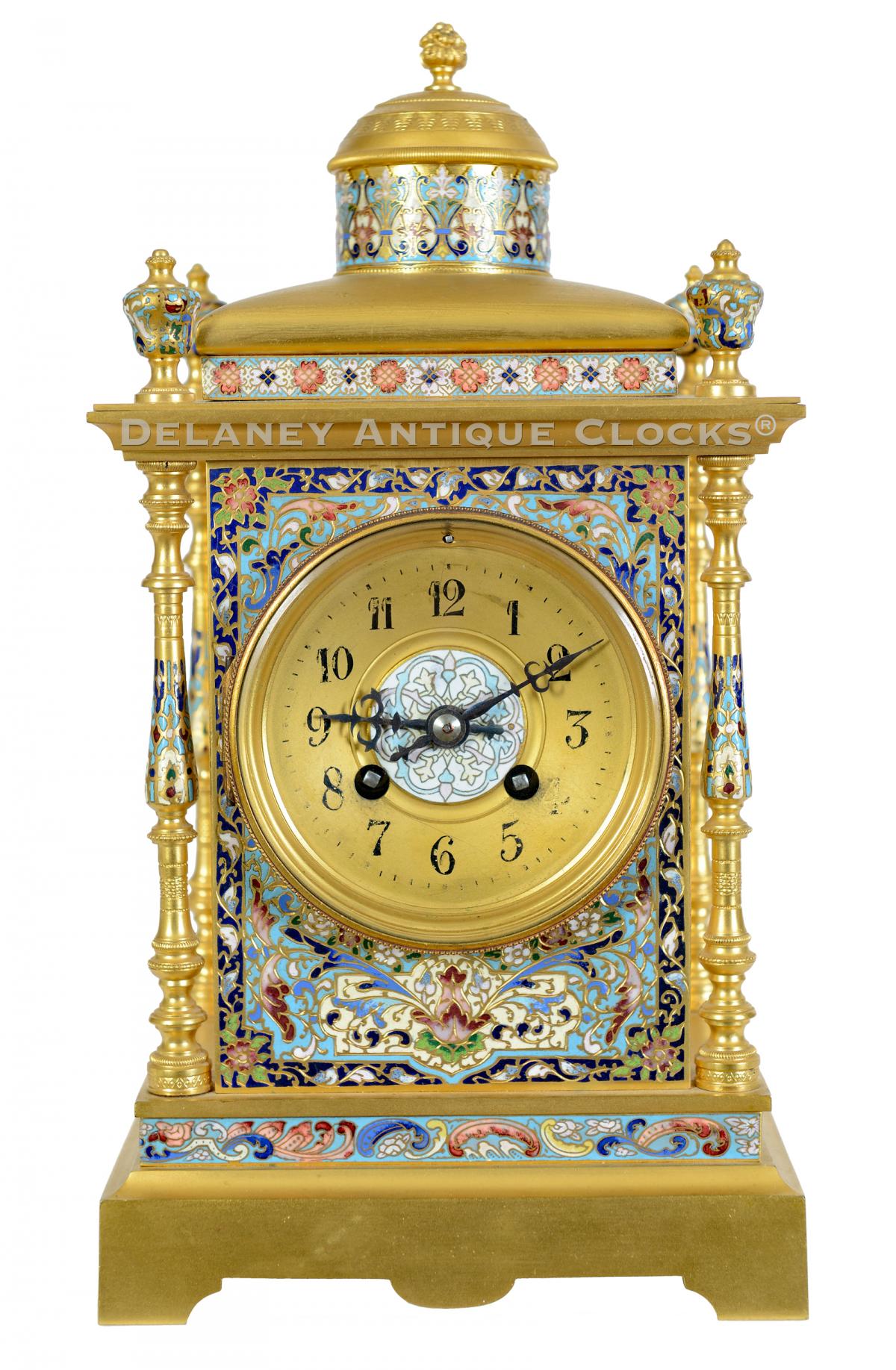 A gilt and champleve’ decorated mantel clock. 223311.