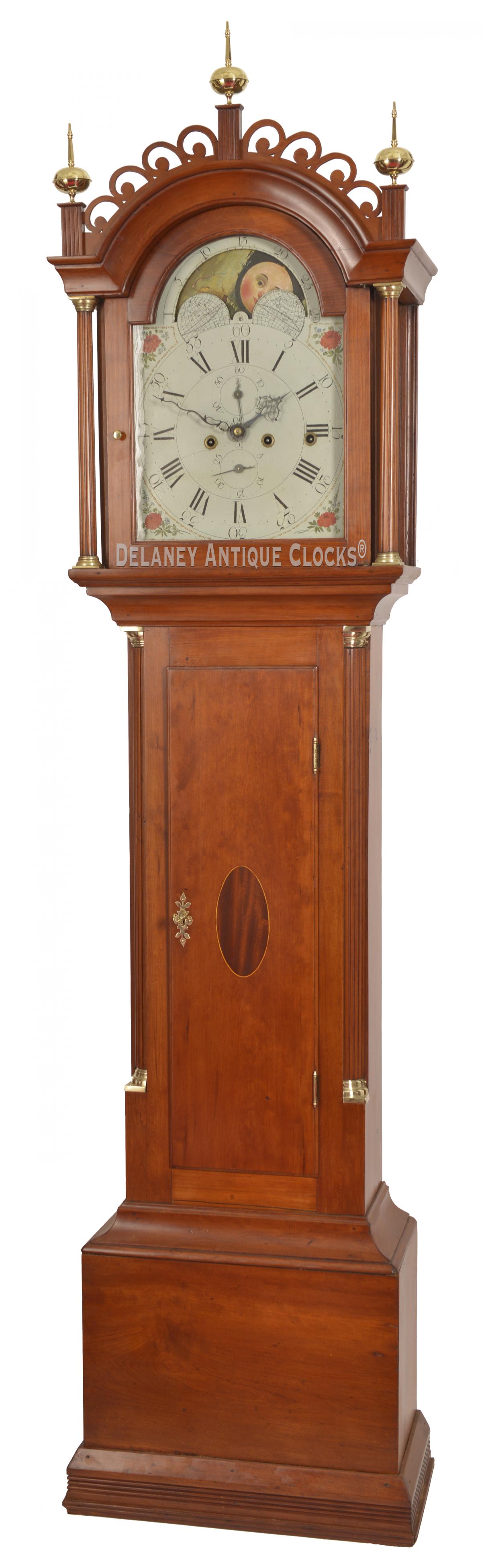 John Fairbanks grandfather clock. This Inlaid cherry tall clock is No. 61. 223008.