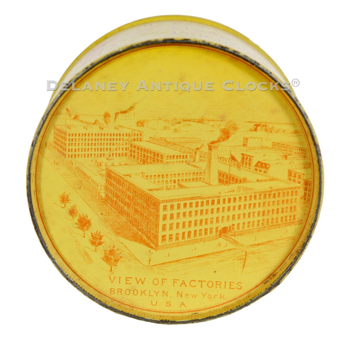 An Ansonia Bee tin in original yellow. 223249.