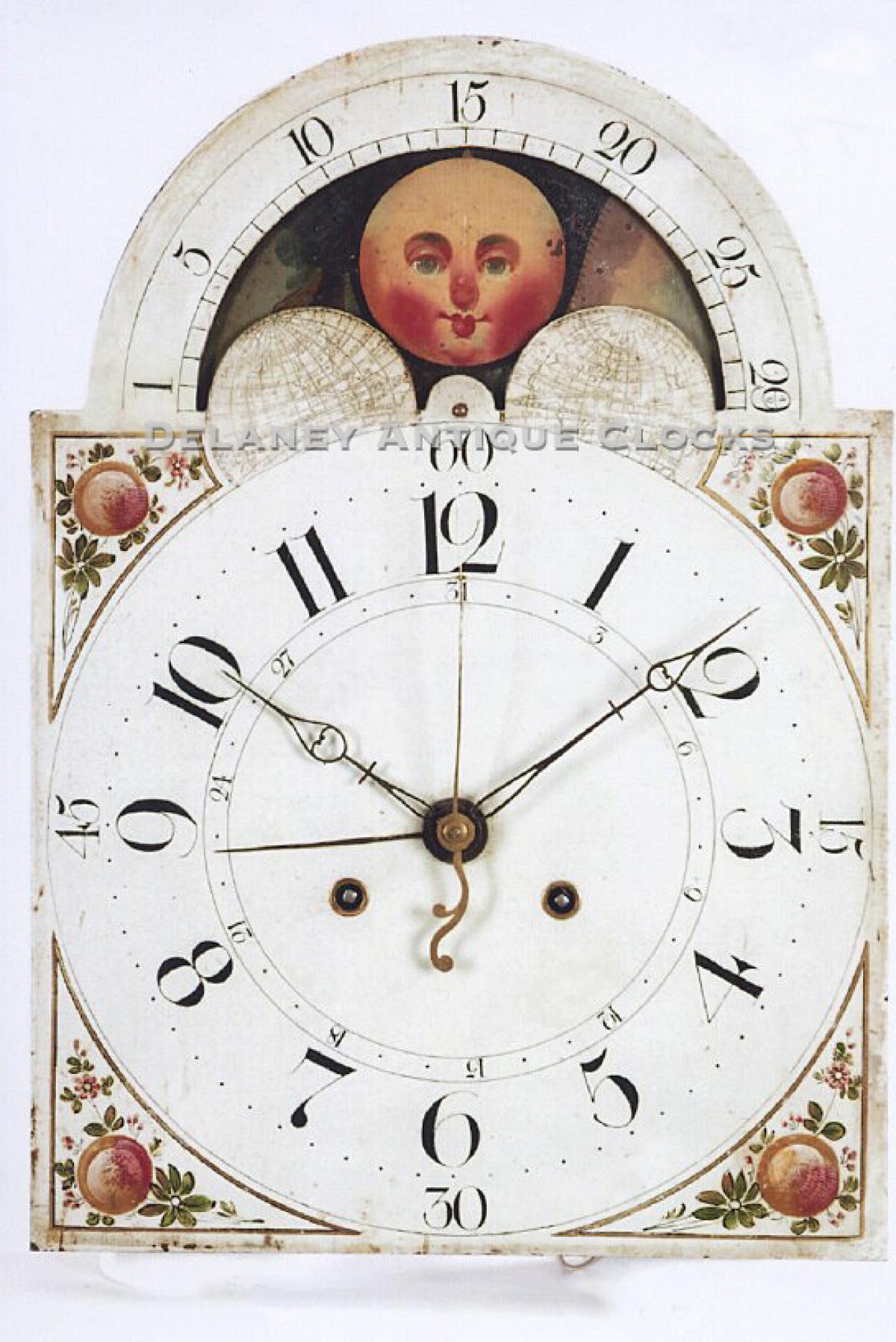 A walnut case tall clock of Pennsylvania origin. Painted lunar calendar.  Four hands off the center arbor. TT-203.
