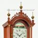 Elmer Stennes Grandmother clock. The inlaid mahogany case houses an automated rocking ship dial. 218048.