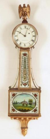 Waltham Clock Company of Waltham, Massachusetts. A wall timepiece or banjo clock with D. J. Steele tablets. 212111. Delaney Antique Clocks.