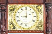 Edmund Currier mirror clock. UU33. Delaney Antique Clocks.