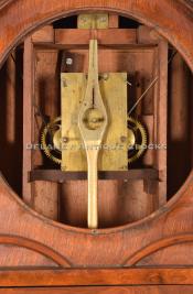 Atkins Clock Company of Bristol, CT. Round Top 8-day Regulator movement. 216024. Delaney Antique Clocks.