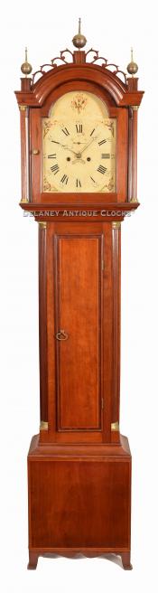 An inlaid cherry case tall clock most likely made on the Vermont side of the Connecticut River. 221224. Delaney Antique Clocks.