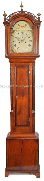 An unsigned cherry case tall clock cross-banded in mahogany. 25124.