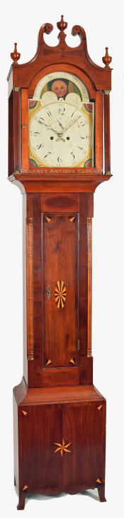 A fine mahogany cased tall clock that is decorated with fancy inlays and cross-banding. Vermont origin. XX-15.