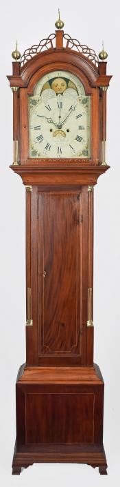 An inlaid mahogany cased tall case clock was made by Simon Willard of Roxbury, Massachusetts. XX-20.