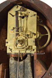 An alarm banjo clock movement featuring and alarm. 221059. Delaney Antique Clocks.