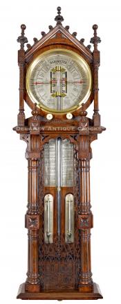 This is Admiral Fitzroy's Royal Polytechnic Barometer. "Joseph Davis & Co." This example is the best that I have seen. The elaborately carved oak case is second to none, and the color is superb. 223001. Delaney Antique Clocks.