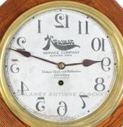 A Reverse Running Kramer Barber Shop clock made by the Waterbury Clock Co. 223058. Delaney Antique Clocks.