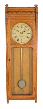 E. Howard 58 wall clock in oak. 224033.