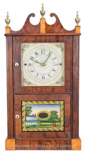 A Miniature Double Door Reeded Flat Column and Scroll Top Clock made by Norris North & Company in Torrington, Connecticut. 224069.