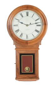 Howard & Co. Model No., 70-12 wall clock in a walnut case. 223130.