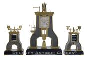 André’ Romain Guilmet of Paris, France. The Steam Hammer Clock Set. 223334.