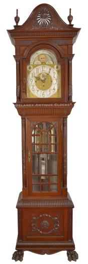 An impressive Tall Hall clock originally retailed by The Cowell & Hubbard Co. in Cleveland, Ohio. 223026.