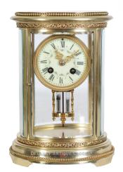 A French-made Oval-shaped Crystal Regulator mantel clock. 223212.