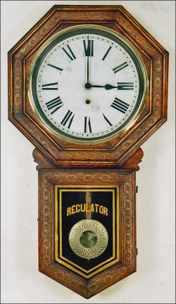 Sessions Clock Company of Forestville, Connecticut. Long drop school clock. HH-1.