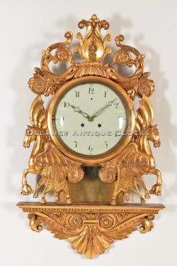 Nils Wiberg of Ystad, Sweden. A very impressive carved case Swedish wall clock. VV-137.