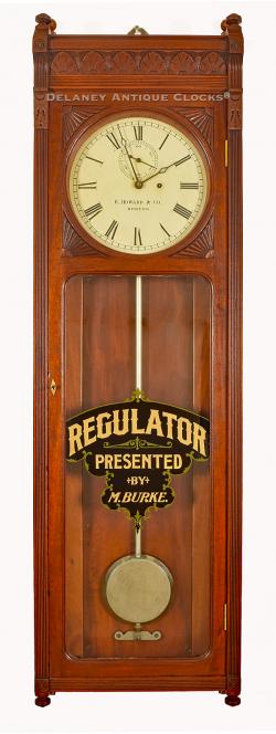 E. Howard Clock Co. Model No. 72-12 Regulator in mahogany. "REGULATOR / PRESENTED / BY / M BRUKE." Dated: 11 – 1886. VV-120.