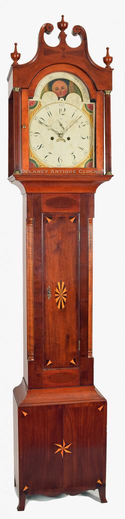 A fine mahogany cased tall clock that is decorated with fancy inlays and cross-banding. This clock and case was most likely made in Vermont. XX-15.