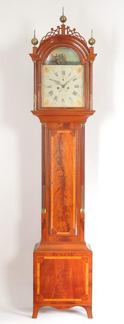 William Cummens of Roxbury, Massachusetts. An inlaid mahogany case tall clock with automated rocking ship dial of Boston origin. 214103.