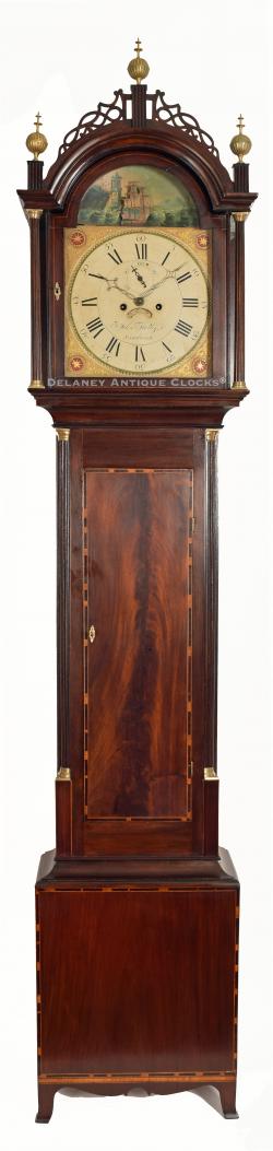 Allen Kelley of Sandwich, Massachusetts. An inlaid mahogany case tall clock featuring a rocking ship dial. VV-3.