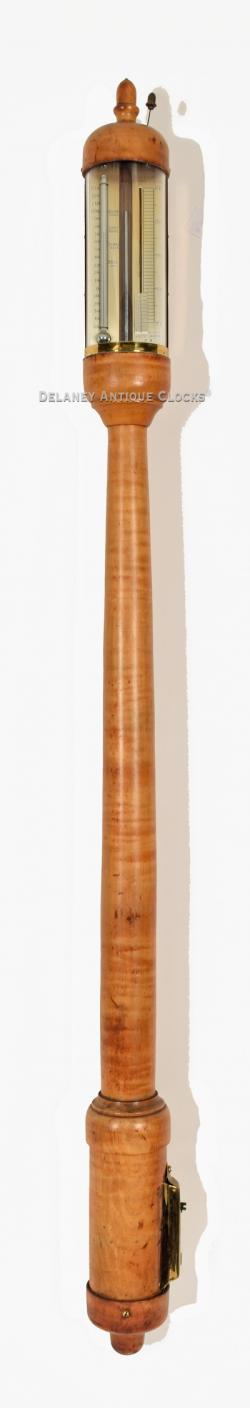 Charles Wilder, of Peterborough, New Hampshire. A super clean tiger maple cased stick barometer. The Bat model. 220034.