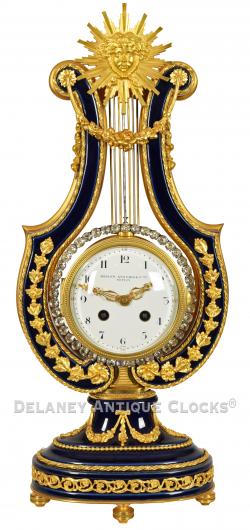 A Louis XVI Style French Lyre Clock retailed by Bigelow, Kennard & Co. Inc. CCC-9.