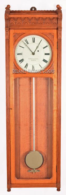 E. Howard & Co. Model No. 58-12. Wall regulator. The largest size in oak. XX-18.