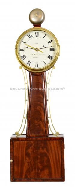 Aaron Willard Jr. of Boston, Massachusetts. A wood-paneled timepiece with an alarm. Number 1929. 223220.