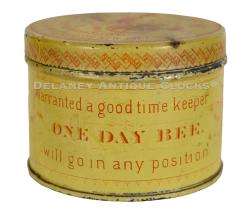 An Ansonia Clock Co. "Bee tin" in original yellow. Country store collectible. 223249.