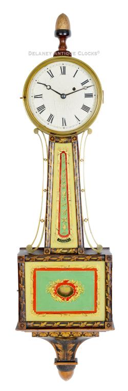 This Federal-style 'Improved Timepiece' or 'Banjo Clock,' with stenciled-decorated frames attributed to the Boston father-and-son partnership of Simon Willard & Son. BBB-19.