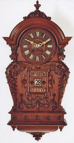 German Black Forest. Carved calendar wall clock. 213165.