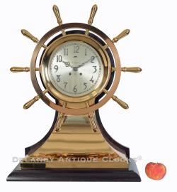 The Chelsea Yacht Wheel Ship's Bell Mantel Clock. This large clock with "Special" 8.5-inch diameter dial was retailed by "George W. Welch's Sons / New York." 224113.