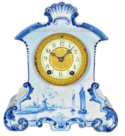 Delft-style china clock case with a Waterbury 8-day gong strike movement. A smaller size. 223173.