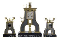 André’ Romain Guilmet of Paris, France. The Steam Hammer Clock Set. 223334.