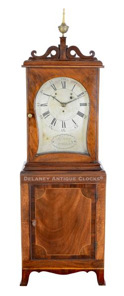 Russell Cheney of Woodstock, Vermont. This inlaid and cross-banded mahogany-cased Shelf Clock with a kidney-shaped dial is numbered 53. 224111.