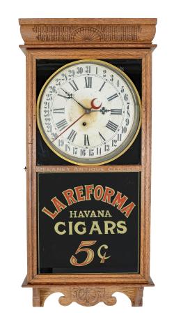 E. Ingraham & CO. Bristol Connecticut. The “WESTERN UNION” calendar clock, a unique piece featuring “LA REFORMA / HAVANA / CIGARS / 5cents” advertising, a testament to the rich history of cigar production. 223242A.