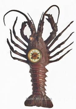 A figural wall clock (Lobster) of French origin.