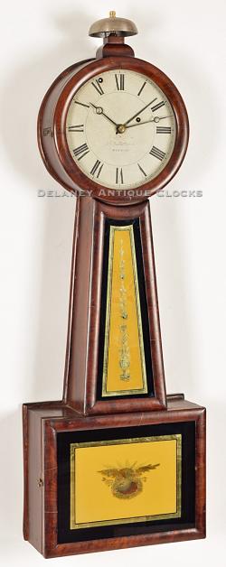 Aaron Willard Jr., of Boston, Massachusetts. An alarm banjo clock or wall timepiece.
